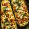Cheesy Garlic Zucchini Steaks